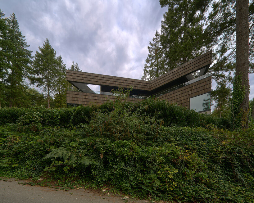 triangular pool juts out from the phoenix house celebrating the canadian coastline - 2