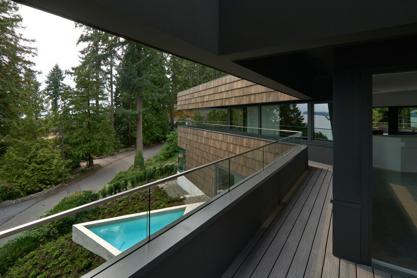 triangular pool juts out from the phoenix house celebrating the canadian coastline - 5