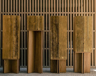 wooden AURUM cabinets clad in 23-karat gold leaf offer various configurations