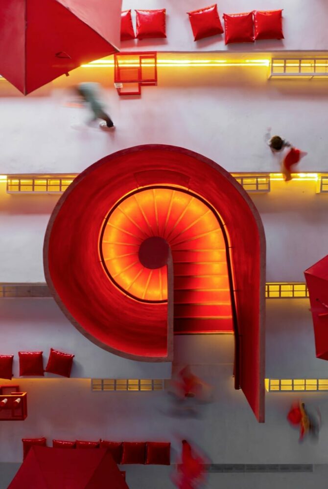 the distinctive red staircase connects the restaurant and the canopy's top