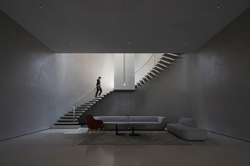 staircase to the meeting room above the water