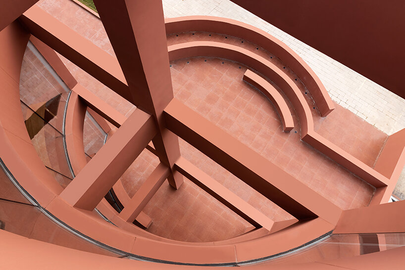 li city study invites 24/7 reading amid a terracotta-hued & skylit backdrop in china - 2