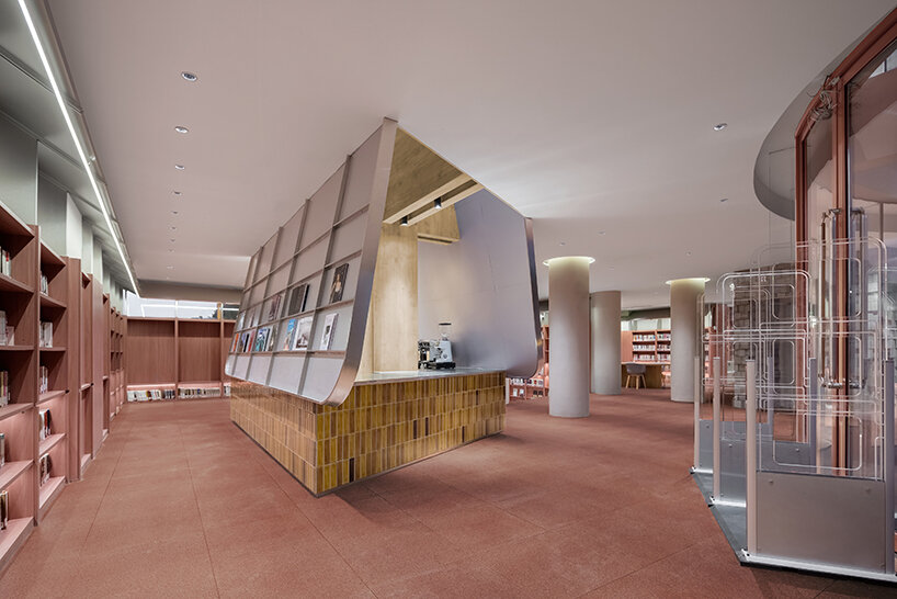 li city study invites 24/7 reading amid a terracotta-hued & skylit backdrop in china - 9