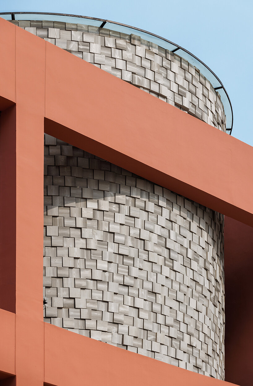 li city study invites 24/7 reading amid a terracotta-hued & skylit backdrop in china - 4