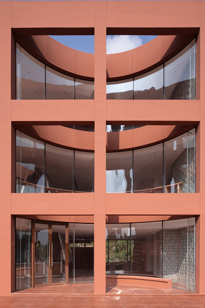 li city study invites 24/7 reading amid a terracotta-hued & skylit backdrop in china - 5