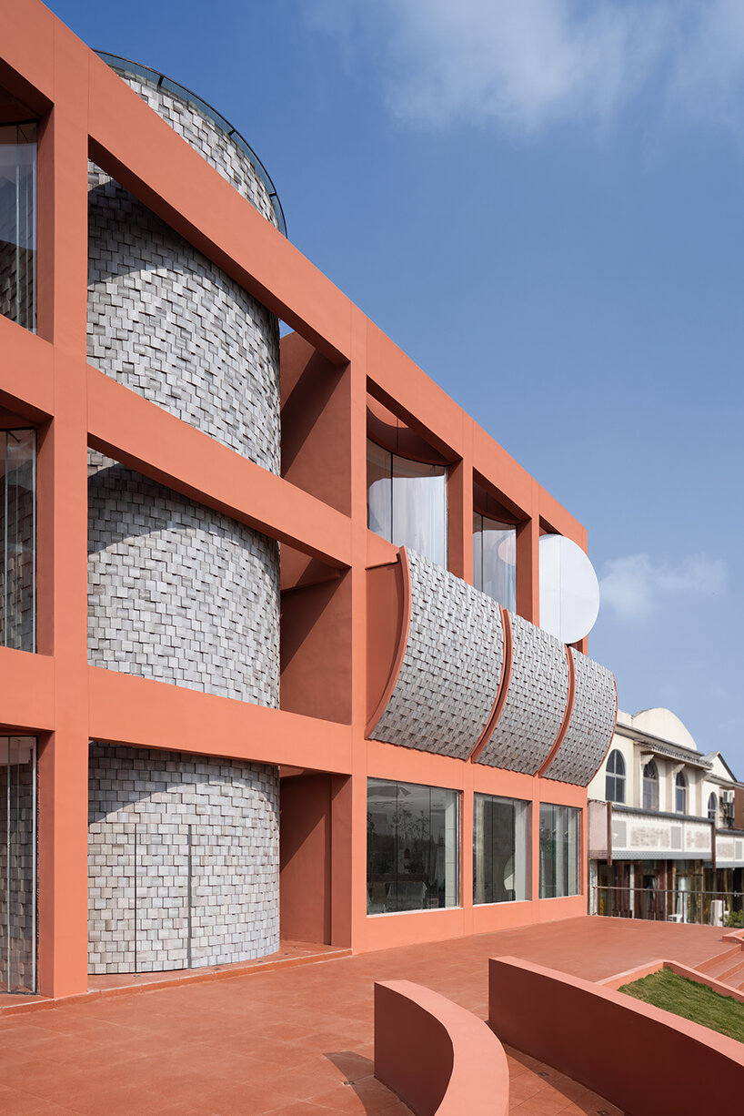 li city study invites 24/7 reading amid a terracotta-hued & skylit backdrop in china - 3