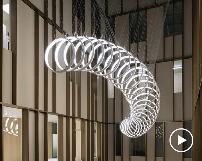 SpY suspends kinetic installation in bern hospital atrium for artistic healing