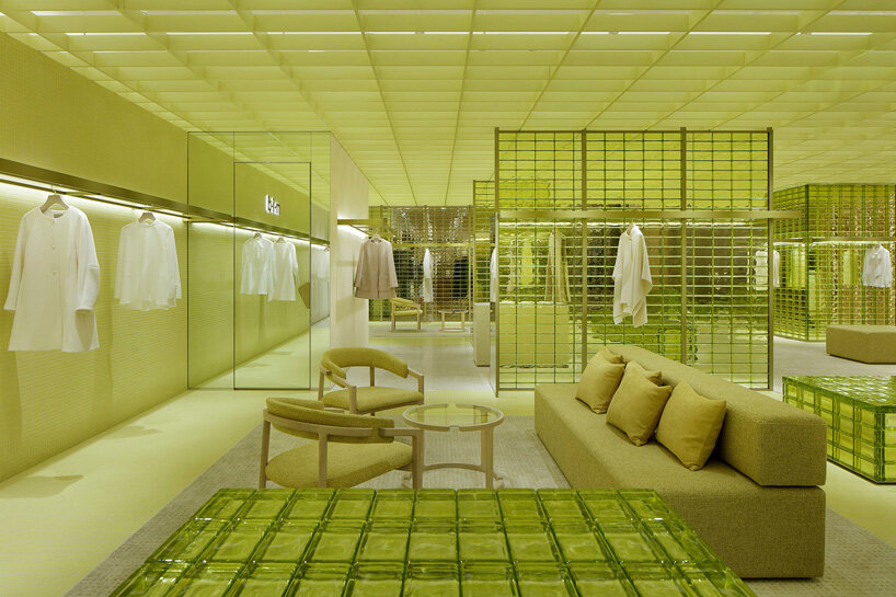 yellow glass bricks and louvers shape curiosity's labyrinthine concept store in osaka