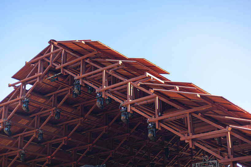 bangkok project studio constructs grand gable roof pavilion for thailand's festival