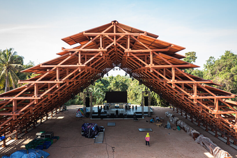 bangkok project studio constructs grand gable roof pavilion for thailand's festival