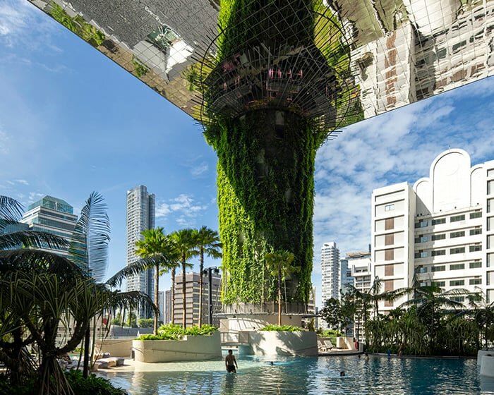 woha implants lush green terraces and swimming pools in high-rise hotel in singapore
