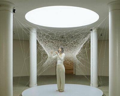 roland halbe captures the testing of AR on a fabric web at berlin's tieranatomisches theater