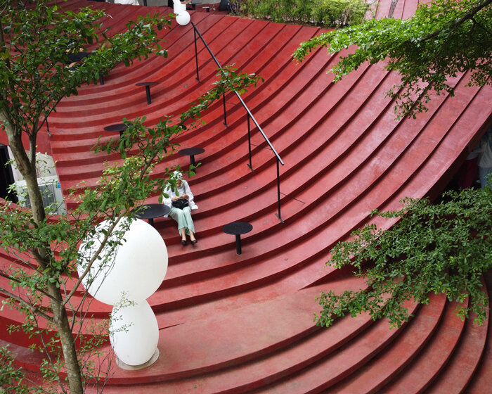 curved concrete steps outline RAD+ar's tanatap café in indonesia