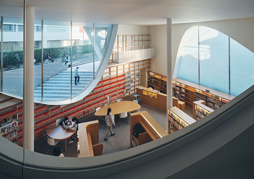 organic openings cut angular learning center in tokyo 