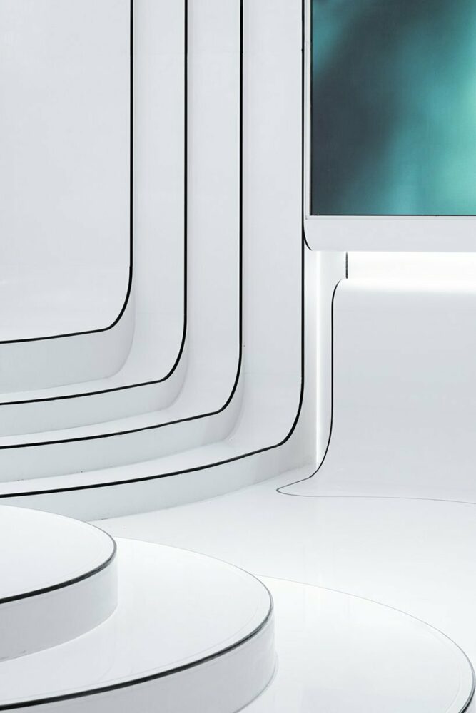 modern minimalist aesthetics of the space connect to the overarching theme of nature