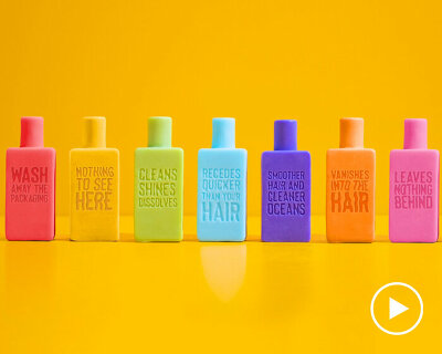 bottle-shaped shampoo bars dissolve with use to reduce plastic pollution