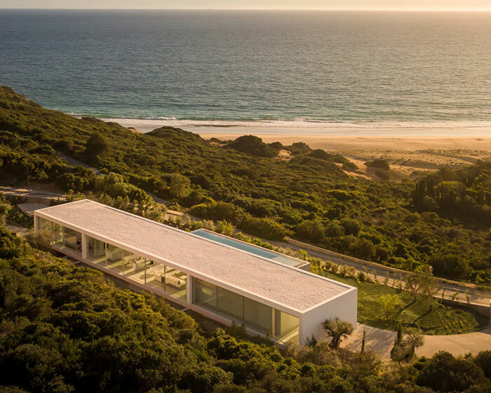 fran silvestre perches this 'house on the air' along the rugged coast of southern spain