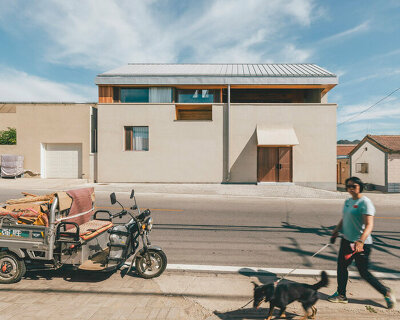 residence by chaoffice unfolds an array of staggered sequences on sloping plot in beijing