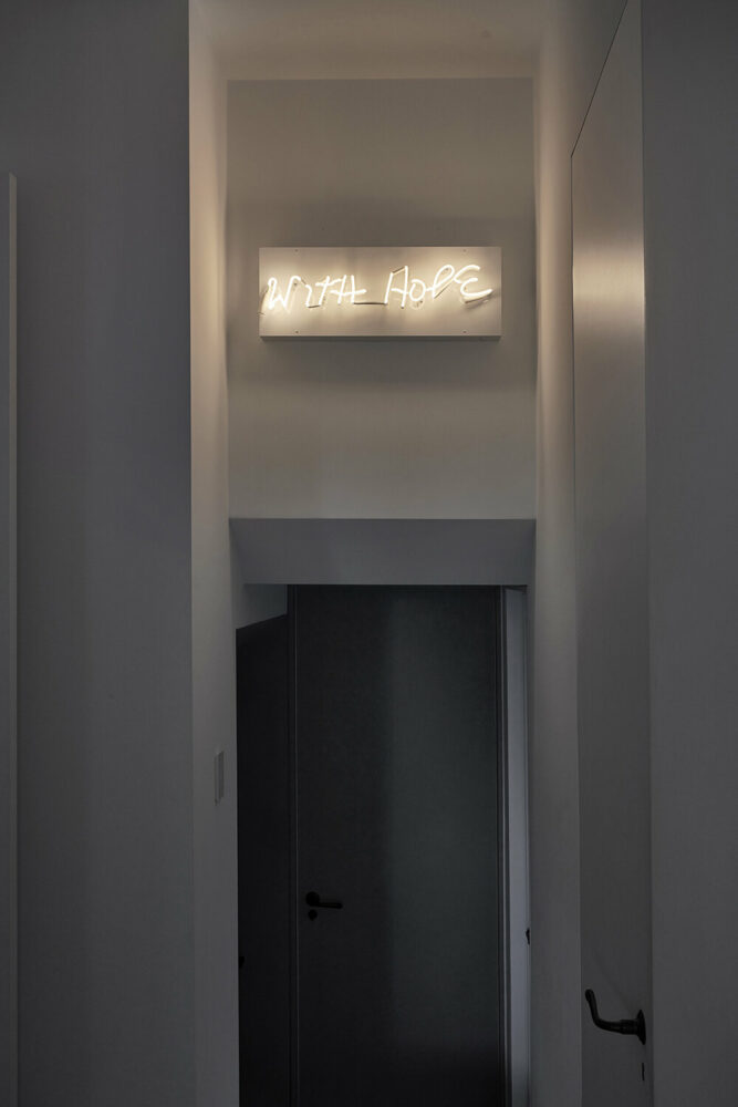 With Hope neon light by Glenn Ligon