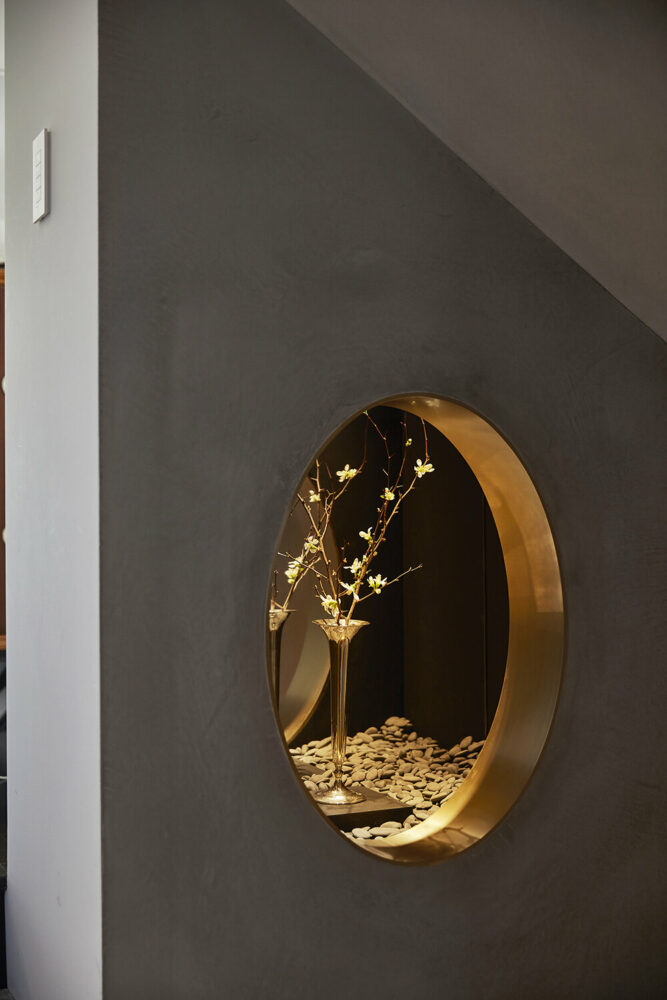 a niche carved into the wall where the excavation began