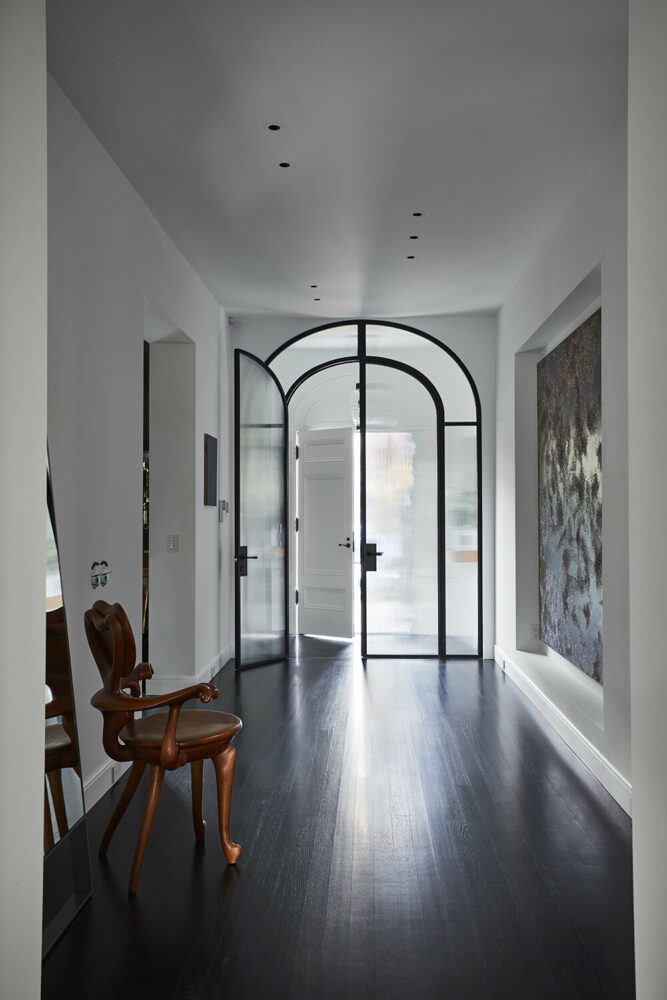 front entry showing new steel-and-glass arched doors