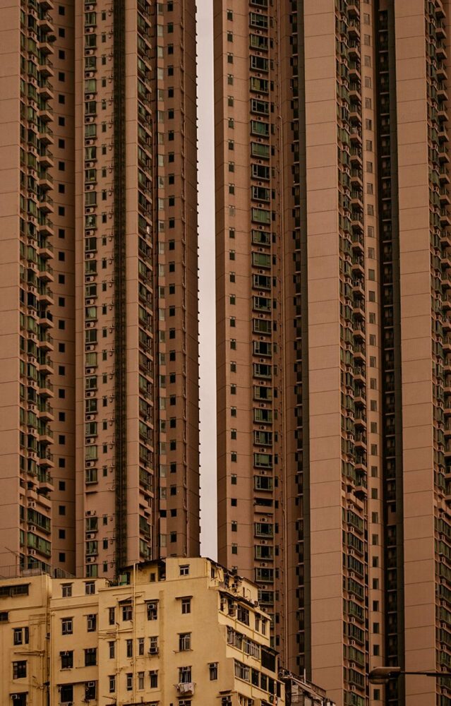 old building against new towers in Kowloon