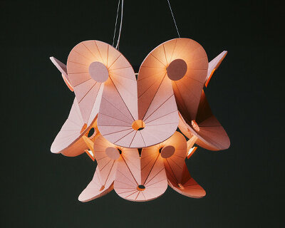 impact acoustic and atelier oï sculpt sound-absorbing luminaire using folded felt panels