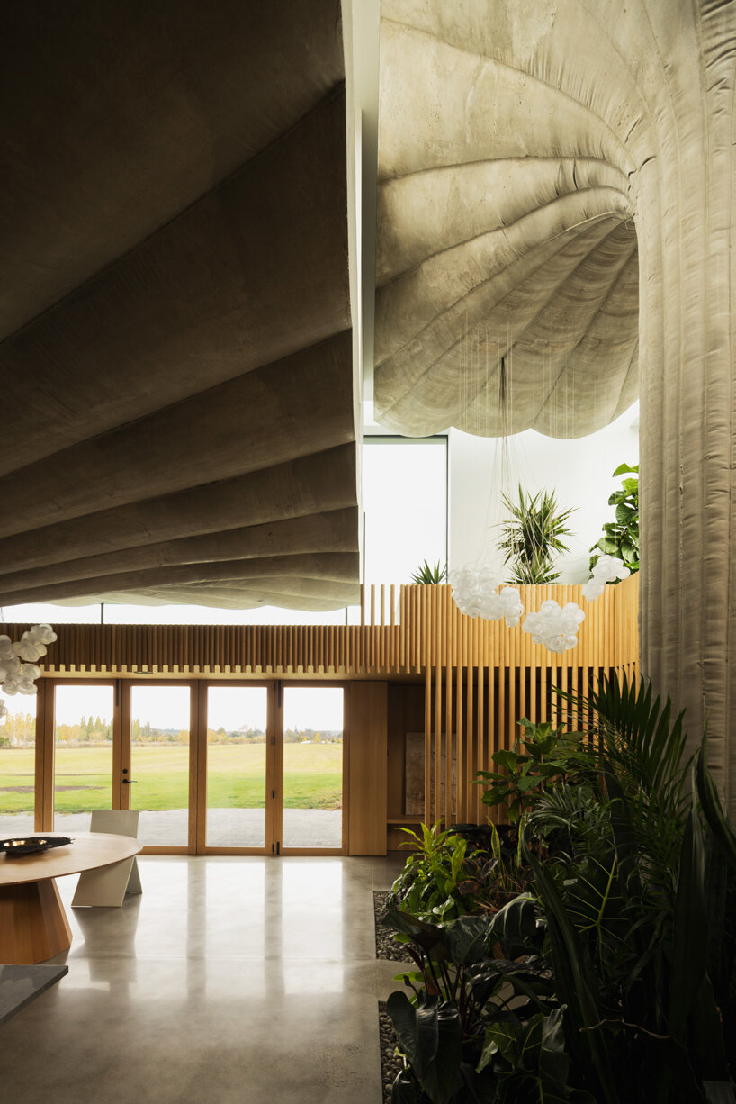 omer arbel crafts lily pad-shaped columns for family home in canada