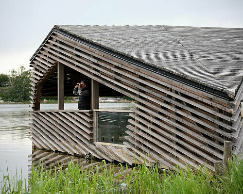 studio puisto designs floating 'piilokoju' hut for birdwatchers in finland