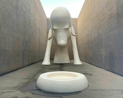 colossal dog sculpture welcomes visitors to yoshitomo nara's solo exhibition in aomori, japan