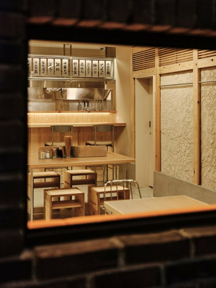 looking from the outside, the distinctive counter stands as the most prominent interior element