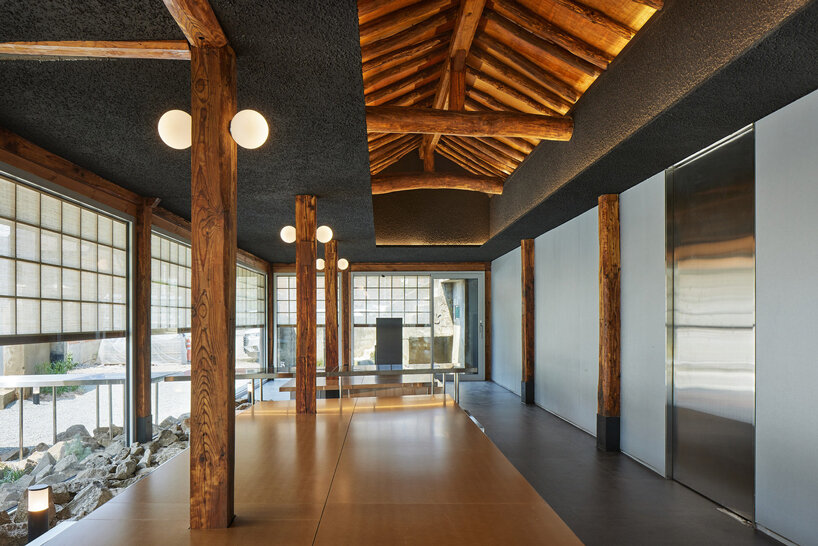traditional wooden hanok roof frame tops nomal's renovated restaurant in korea - 1