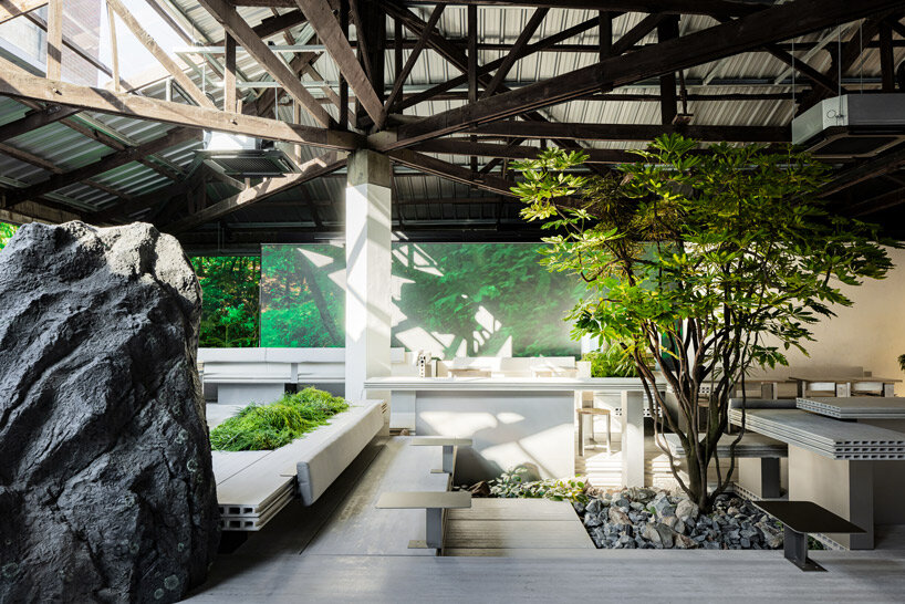 WGNB's beauty store in seoul recreates imaginary island landscape with giant rocks 