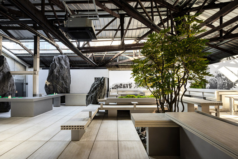 WGNB's beauty store in seoul recreates imaginary island landscape with giant rocks 