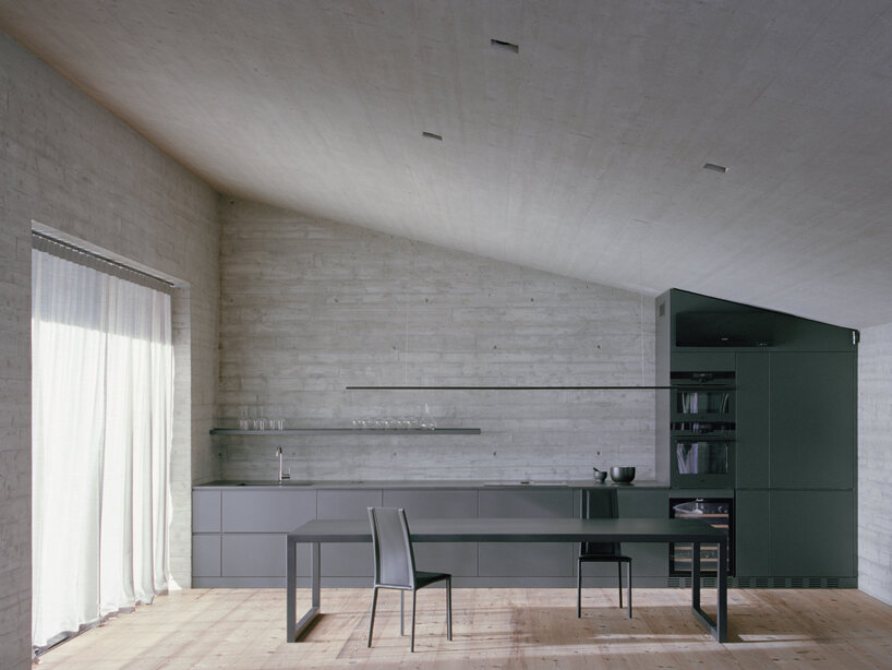 alfredo vanotti's B house embraces open courtyard οverlooking sassella vineyards in italy