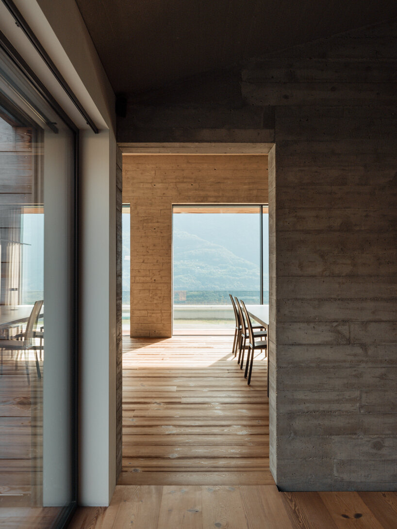 alfredo vanotti's B house embraces open courtyard οverlooking sassella vineyards in italy