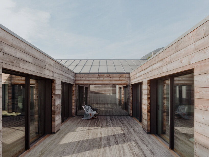 alfredo vanotti's B house embraces open courtyard οverlooking sassella vineyards in italy