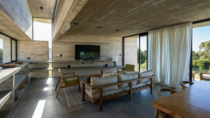 formal simplicity is disrupted by alignment adjustments of prisms and folded roofs