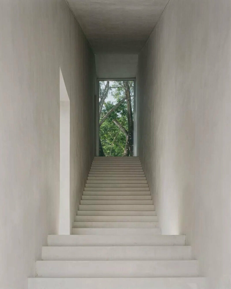 the public stair acts as an open tilted tunnel connecting the terrain and the sky