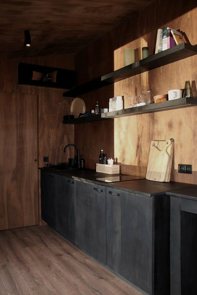 light reflected in the surface of water imprints on the wall