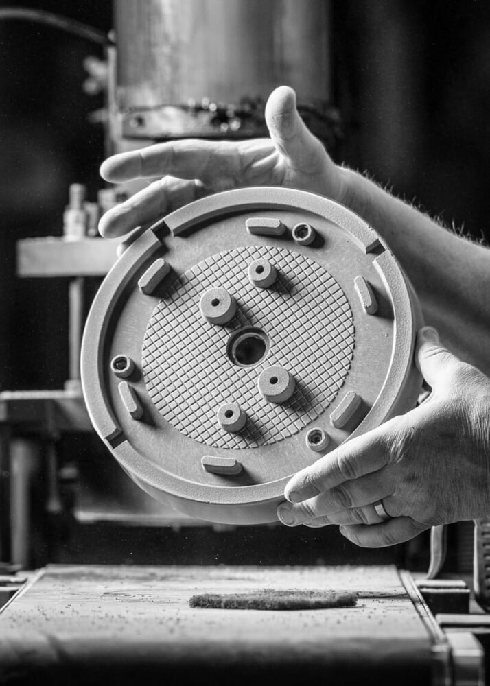 a freshly pressed porcelain base for the Solenne collection, soon ready to be dried, fired, and glazed