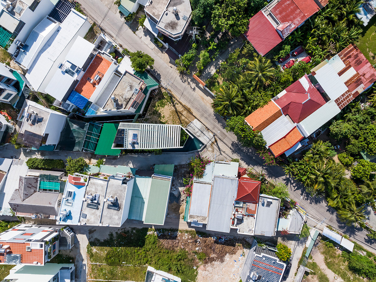 cutout patios bring nature inside pham huu son's skygarden house in