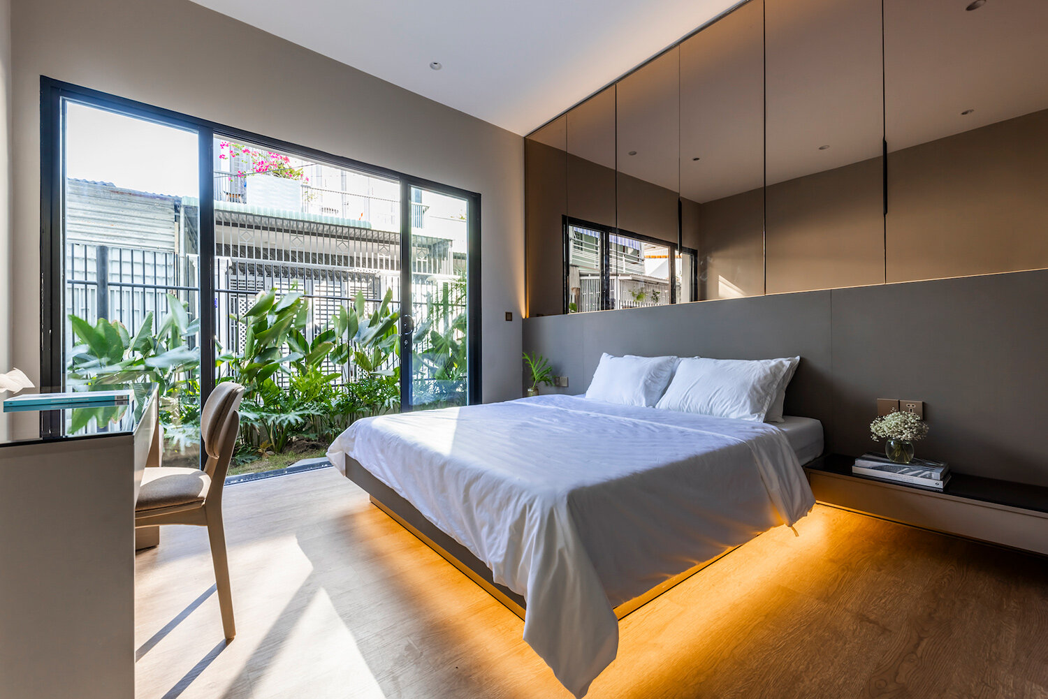 cutout patios bring nature inside pham huu son's skygarden house in