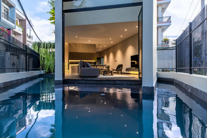 the interior is designed with a minimalist style, using warm tones to create a cozy and luxurious space