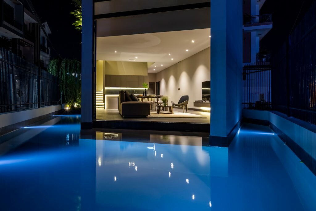 cutout patios bring nature inside pham huu son's skygarden house in