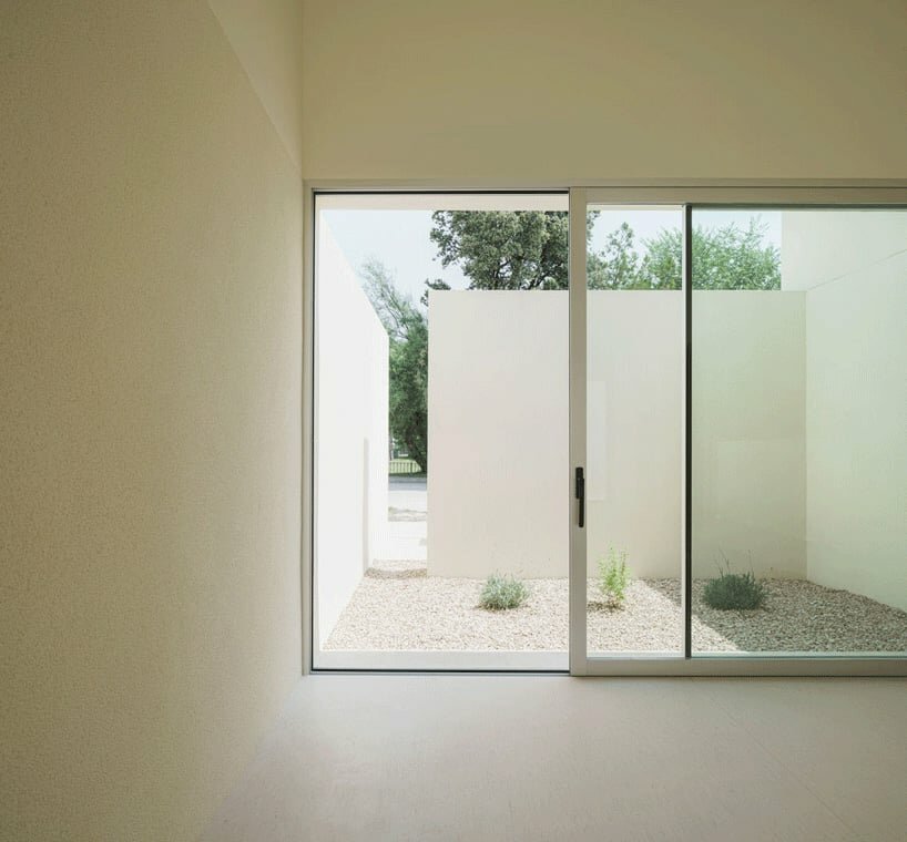 the classroom seamlessly integrates with the rural landscape