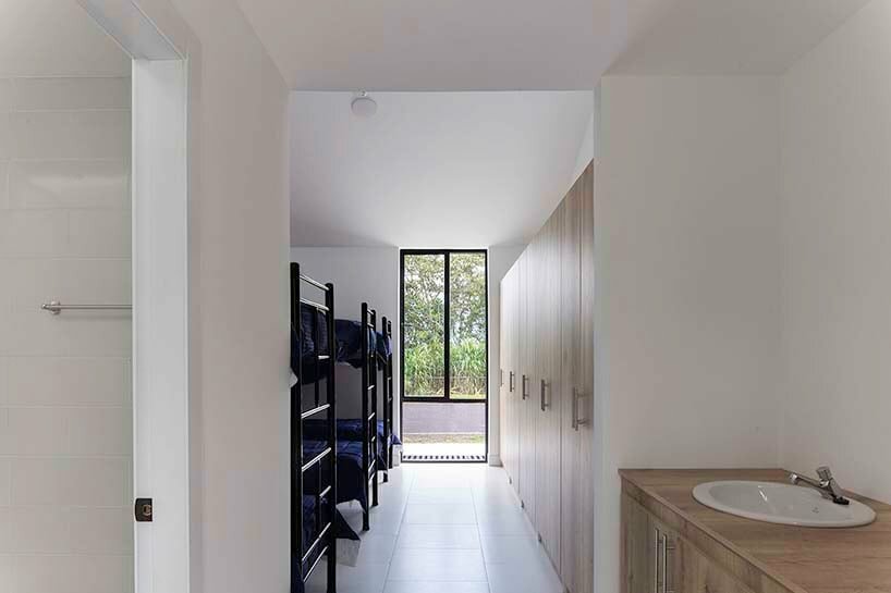 the private wing includes bedrooms, meeting areas, and rest spaces, ensuring a comfortable living environment