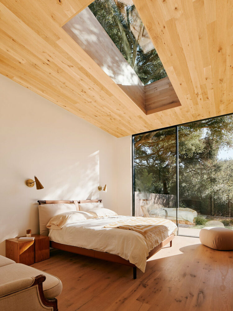 large windows and panoramic skylight above the master bedroom