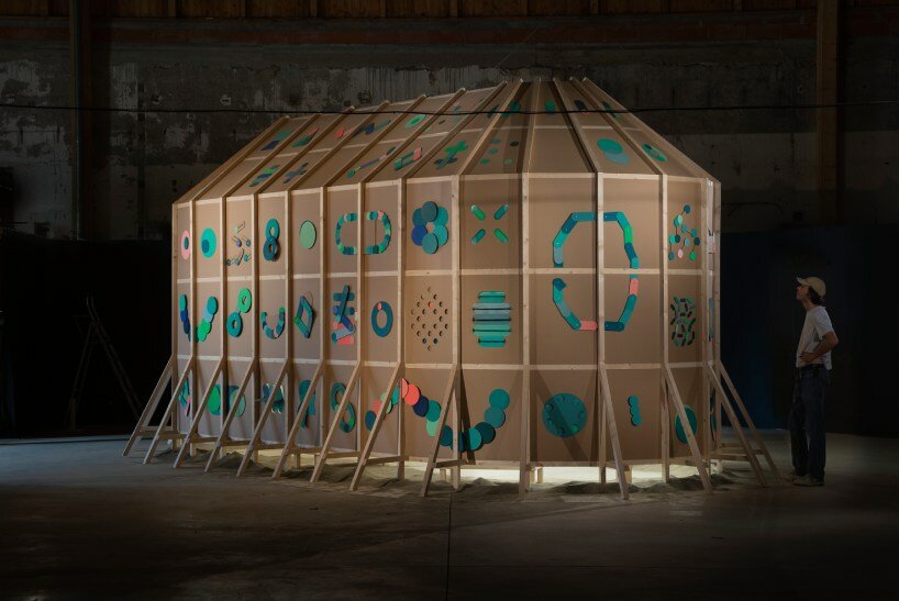whirring panels animate pinaffo & pluvinage's cardboard installation, powered solely by sand 
