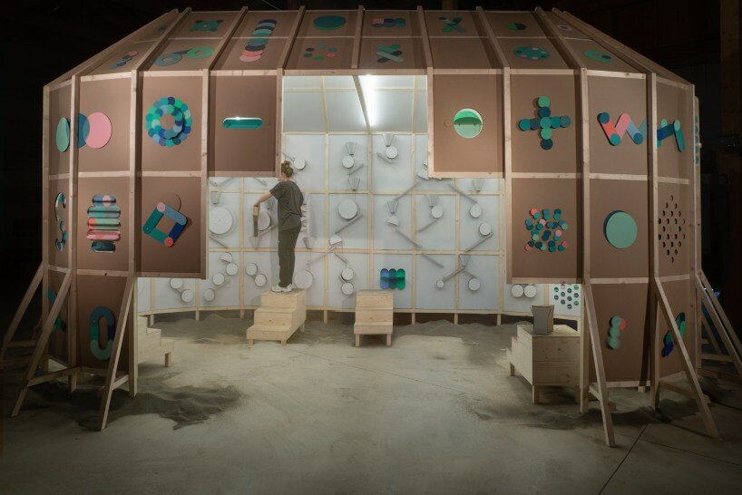 whirring panels animate pinaffo & pluvinage's cardboard installation, powered solely by sand 